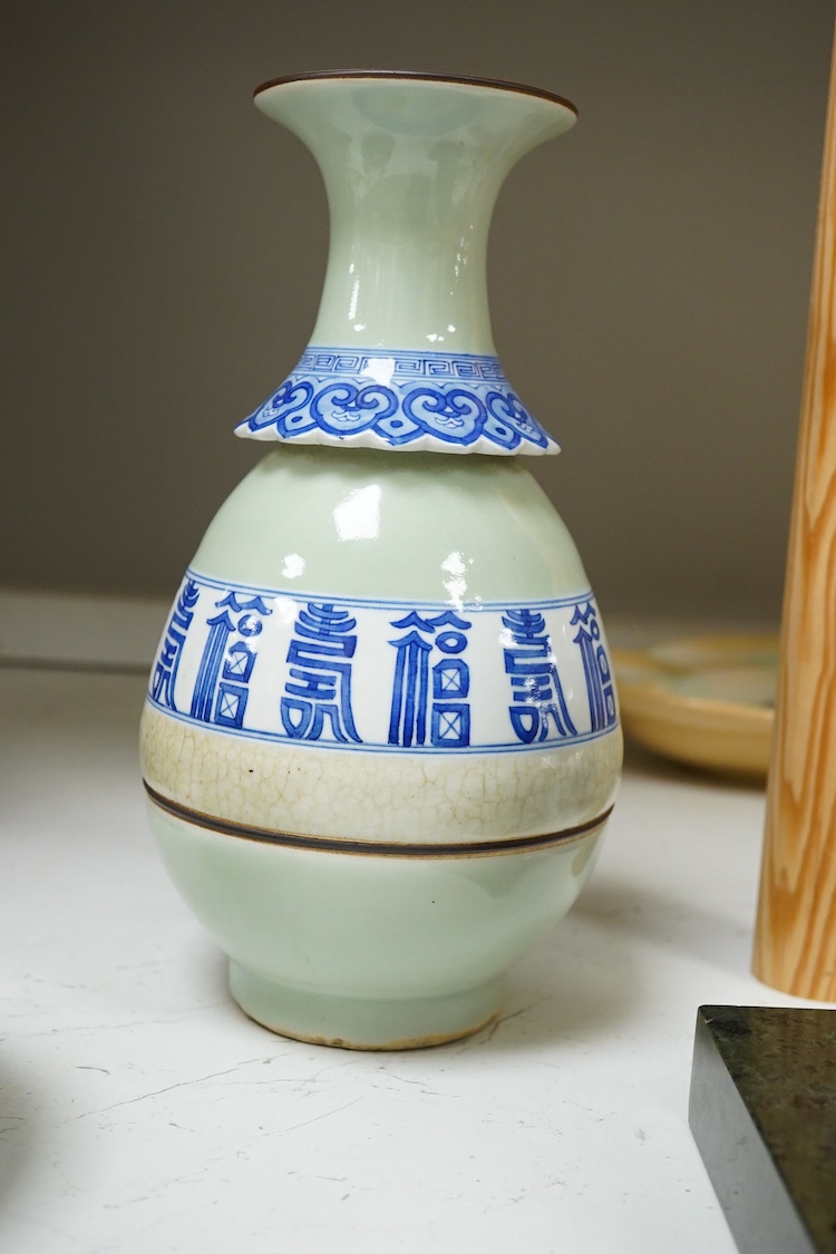A Chinese celadon and blue and white vase, a dish decorated with birds and flowers and a pot and cover, largest 23cm in diameter